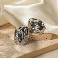 MOLTEN SILVER STUDS